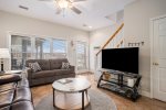 Two Birds One Stone`s Cozy Living Room Space Perfect for Family Movie Nights
